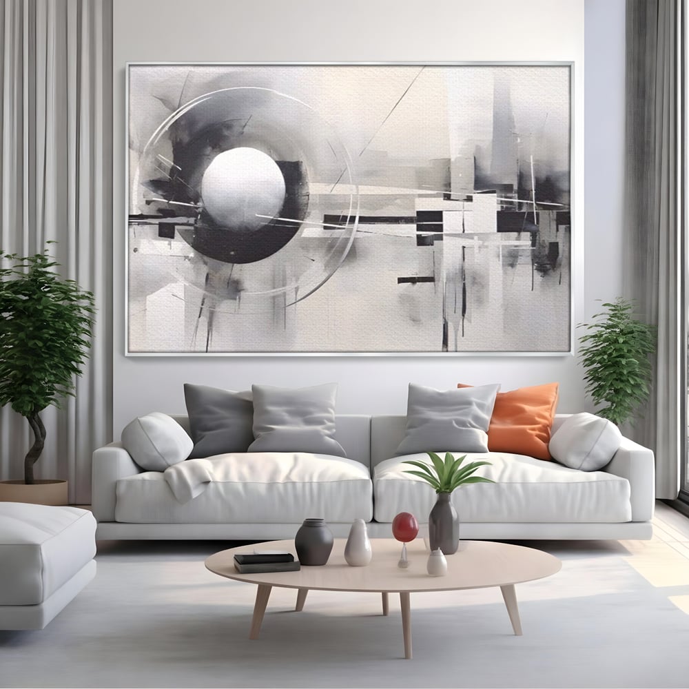 Tablou canvas cu pictura abstracta cu sfera si cercuri, in rama de aluminiu argintiu, pe perete intr-un living